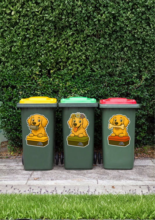 Three wheelie bins with dog stickers on a grassy background.